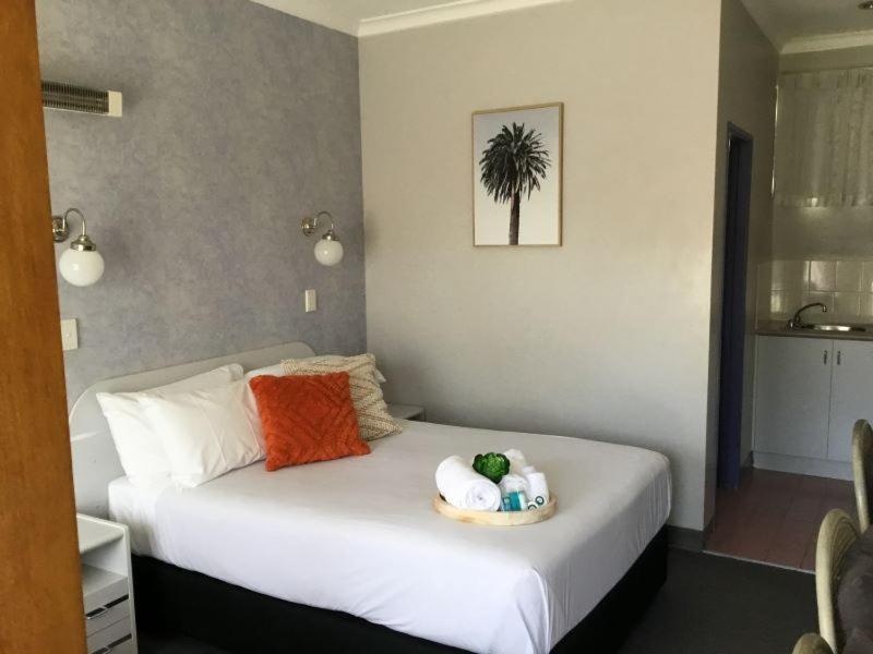 South Pacific Palms Motor Inn Танкарри Экстерьер фото